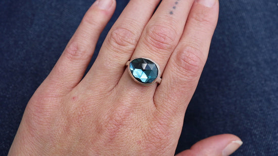 Load and play video in Gallery viewer, Sterling &amp;amp; 14K Gold Ring with Small Asymmetrical Rose Cut London Blue Topaz
