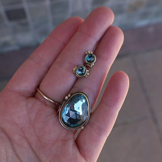Load and play video in Gallery viewer, Bezel Set London Blue Topaz with Three Diamond Dot Ring
